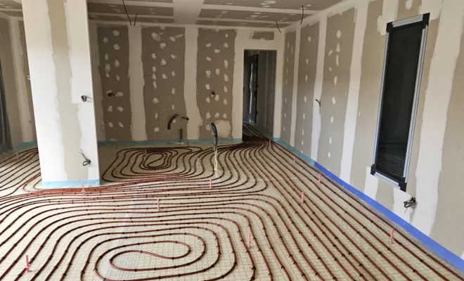 Polyuréthane projetée + bande quadrillée pour plancher chauffant